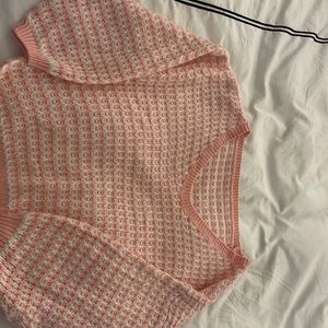 Pink and white sweater
